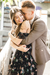 Naklejka premium Young couple in love posing on camera