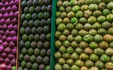 Background with fresh tomatoes, avocados and onions