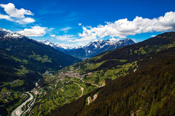 Fototapeta na wymiar Alpen, Schnee, Berge, Wolken, Österreich, Fließ