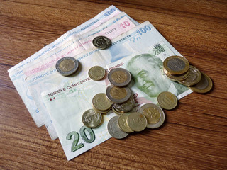 Turkish bills and coins. Coins on money background