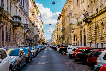 Fototapeta na wymiar A cars on the street of old town in Europe