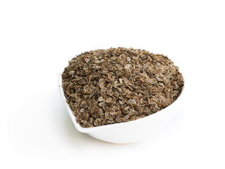 Dry dill seeds isolated on white background