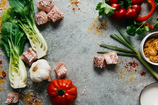 Red snapper and vegetables on marble