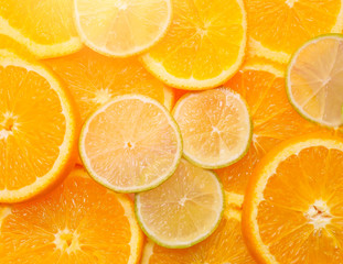 juicy lime and orange slices. close-up