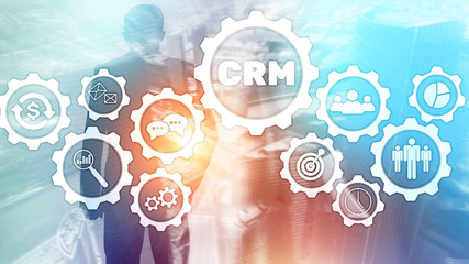 CRM, Customer relationship management system concept on abstract blurred background.