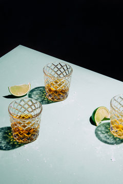 Three tequila shots with lime