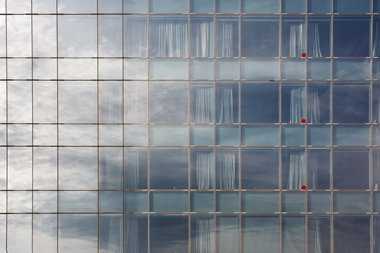 Glass office or residential building in sunlight.