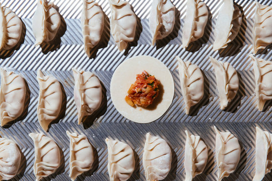 Fresh dumplings on purple background