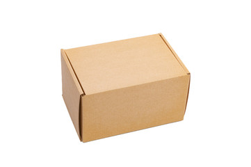 Closed brown cardboard box isolated on white background