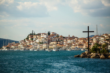 Fototapeta na wymiar Poros island, view of the coast from the sea Harbor, Greece, Aegean sea.