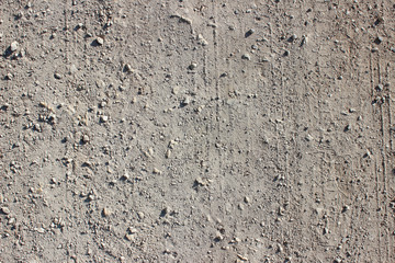 Dirt road tire tracks close up pebbles
