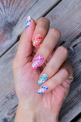 nail art manicure with colorful polish nails. Beauty hand and stylish nails.
