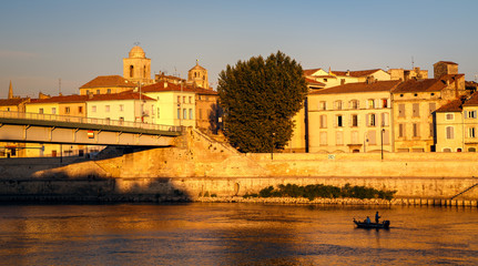 Arles, view to historic town from the river. Golden hours, Arles, Provence-Alpes-Cote d'Azur,...