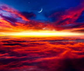  Abstract big explosion .  Light from sky . Religion background . beautiful cloud . background sky at sunset and dawn . Paradise heaven  .  Crescent moon with beautiful sunset background . 