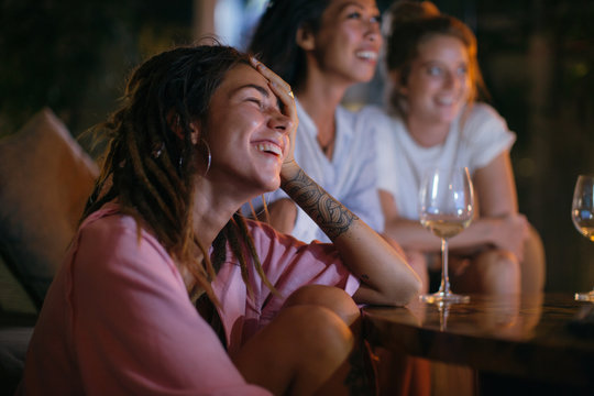 Girlfriends enjoying evening at home together