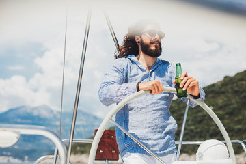 Portrait of Long-haired Man on Sailing Boat