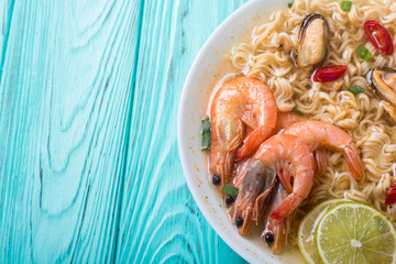 Instant noodles soup with shrimps and mssels . Asian food