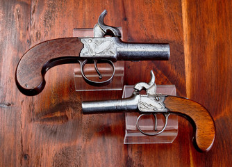 Antique English Percision Muff Pistols.