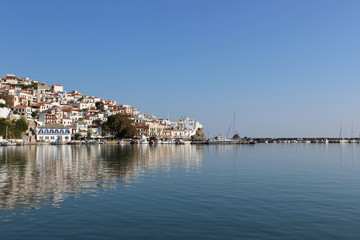 Fototapeta premium Skopelos island greece mediterranean town panorama harbor port reflection