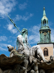 Fototapeta na wymiar The Neptune Fountain in the Alexanderplatz district of Berlin Germany