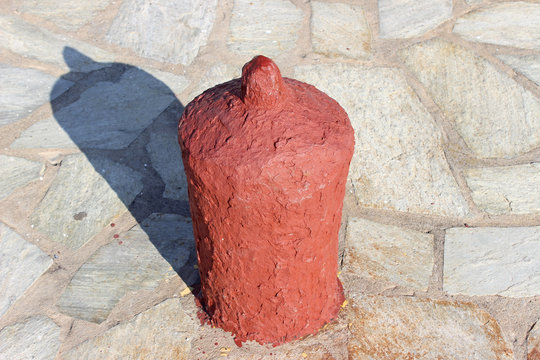 Old Antique Weathered Phallus Shaped Red Ship Boat Bollard