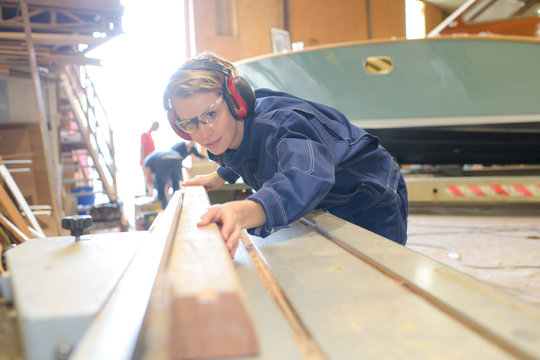 Female Ship Builder At Work