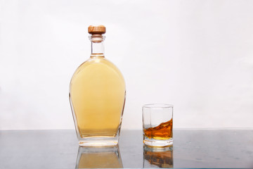 A Bottle and glass of Bourbon