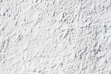 White uneven historical building outer wall detail texture fragment background specks streaks