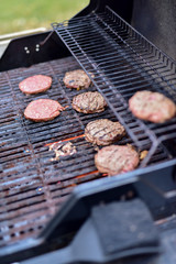 Grilling Hamburgers on outdoor Barbecue Grill