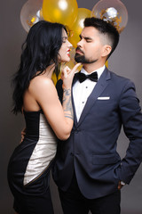 Elegant woman flirting with man