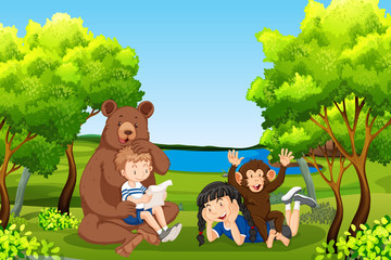Obraz na płótnie Canvas Kids with friendly animals in forest