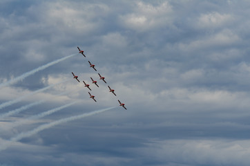 Synchronized aerobatic planes performing at an air show in Swift Current, Saskatchewan, Canada