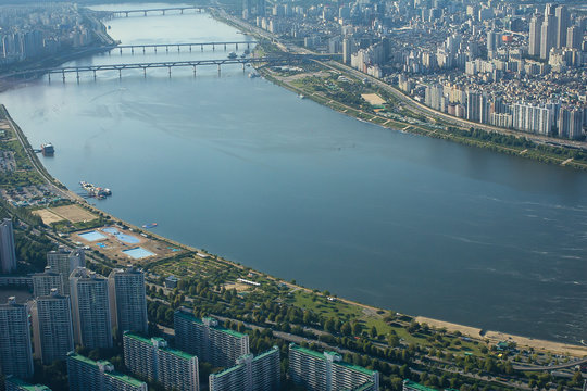 The picturesque view of the Han River and its bridge in downtown Seoul