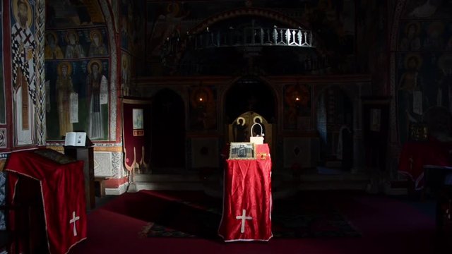 View inside Orthodox monastery church. Altar, icons and decoration