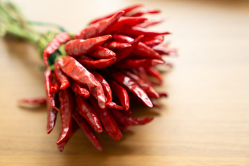 Dried red chili on a wood table