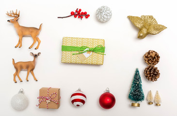 Christmas ornaments with a gift box on a white background