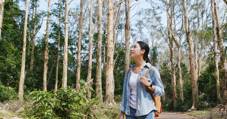 Woman look at the forest when hike