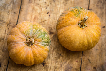 pumpkins on wooden table