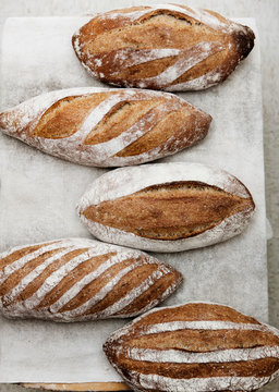 Artisan Bread Cools On A Cloth.