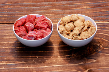 Two containers, one with beef in pieces and the other with soy meat also in pieces