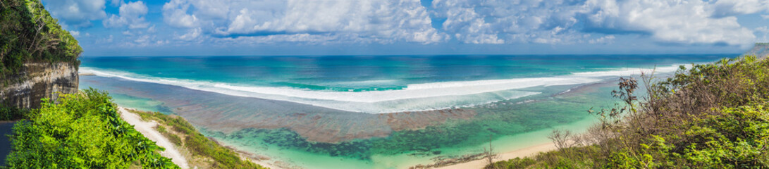 Fototapeta na wymiar Large panorama, Banner, long format Beautiful Melasti Beach with turquoise water, Bali Island Indonesia