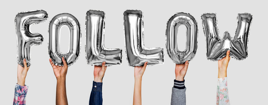 Hands showing follow balloons word
