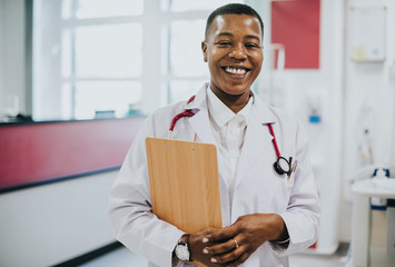 Happy doctor at a hospital