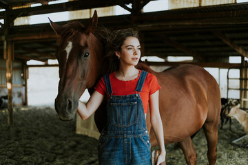 Portrait of a girl and a horse
