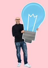 Happy man with a light bulb icon
