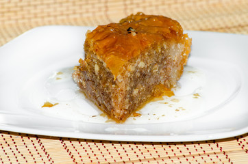 Baklava a rich, sweet dessert pastry layers of filo filled with chopped nuts and sweetened and held together with syrup or honey
