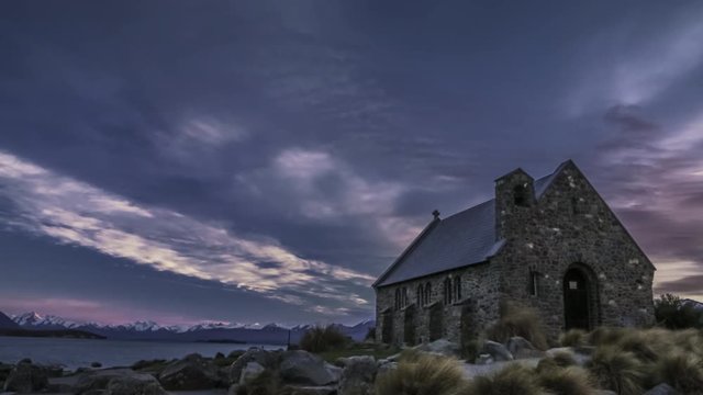 Church of the Good Shepherd on the bank of Lake Tekapo. One of the main tourist attractions on the South Island during precious few quiet moments with no people around. Timelapse video.