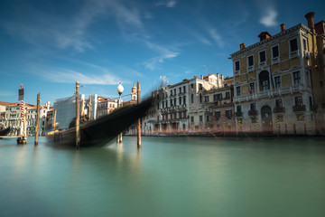 Fototapeta premium View on Grand Canal in Venice with parked gondola.Long exposure shot