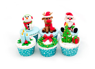 Fototapeta premium Christmas homemade cupcakes isolated on white background
