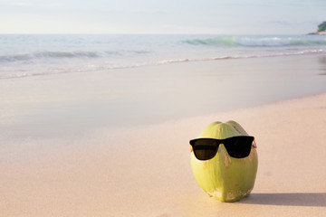 Coconut Visit the sunset on the beach. Background is a natural, creative, tropical style background made in Phuket, Thailand.